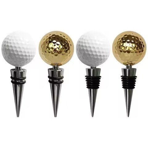 Four wine stoppers with white and gold dimpled balls