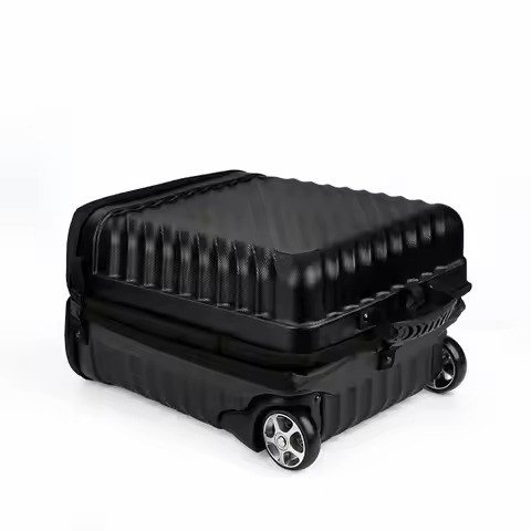 Hard-shell golf travel case on four wheels