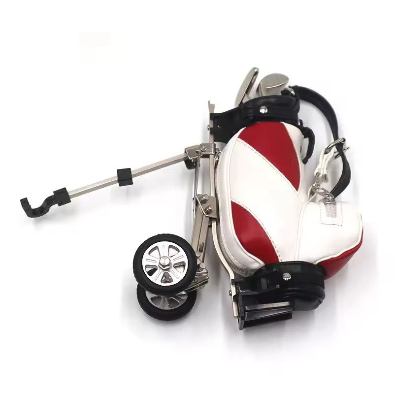 Miniature golf bag and trolley desk pen holder, a corporate gift and pro shop souvenir item